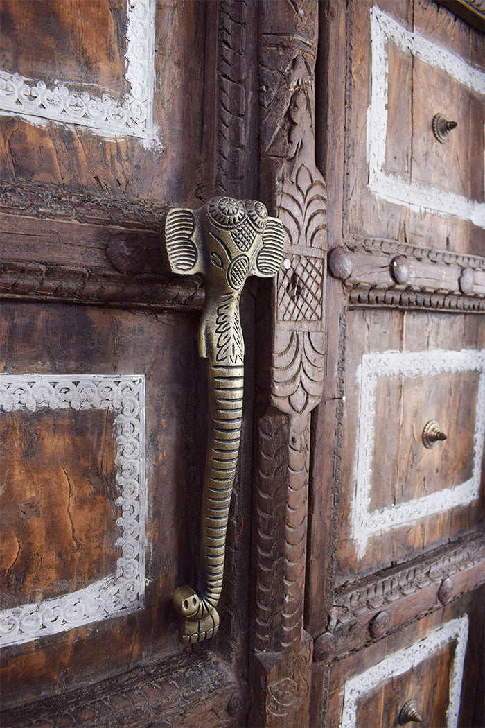 an elephant-shaped door handle.