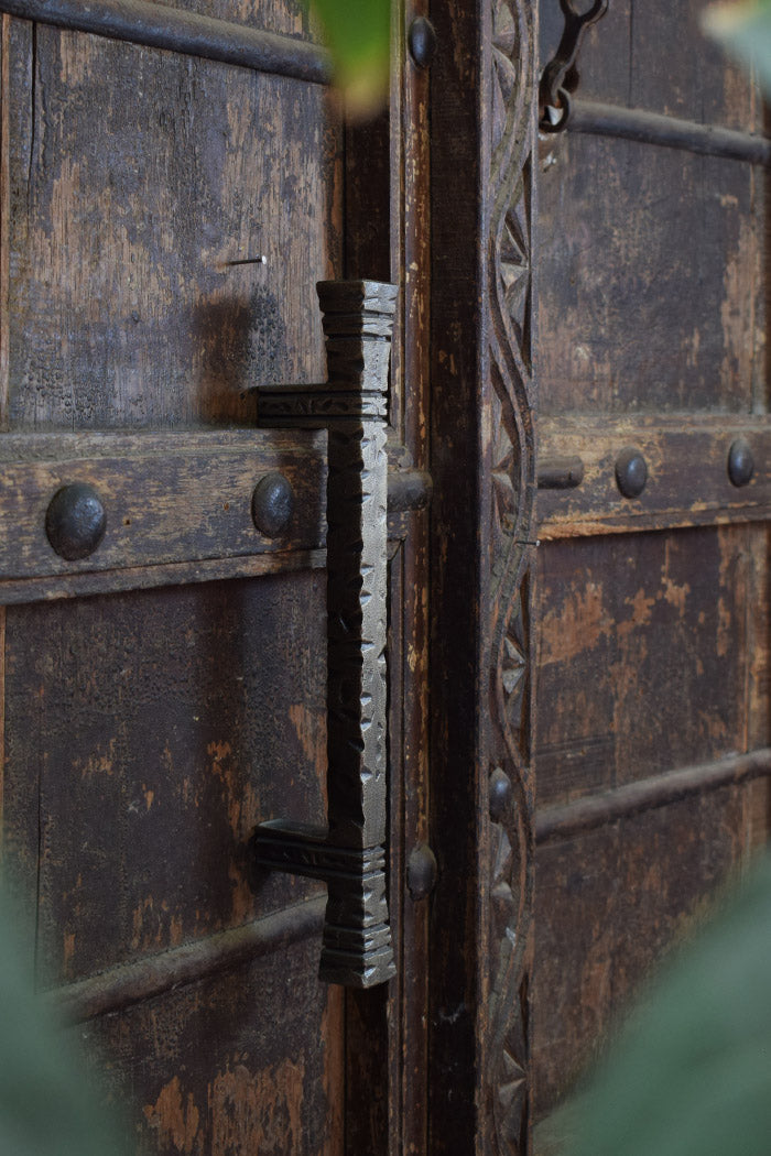 wooden door with metal door handle