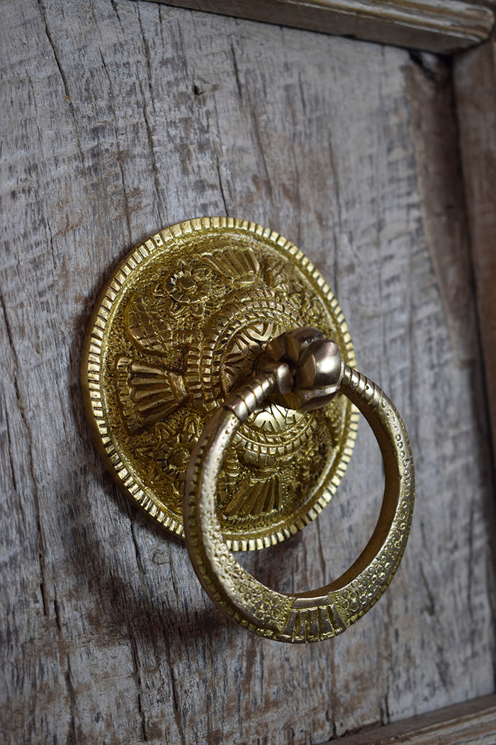 door knocker on a wooden door