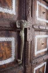 an elephant-shaped door handle.